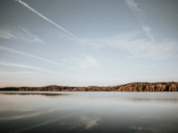 Sky reflecting over water